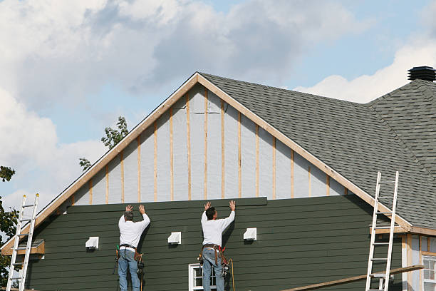 Professional Siding technician working in Severna Park, MD